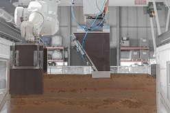 Die Forschenden haben eine mitlaufende Schalung und ein Verdichtungswerkzeug entwickelt, das robotisch betrieben wird.  Joschua Gosslar/TU Braunschweig